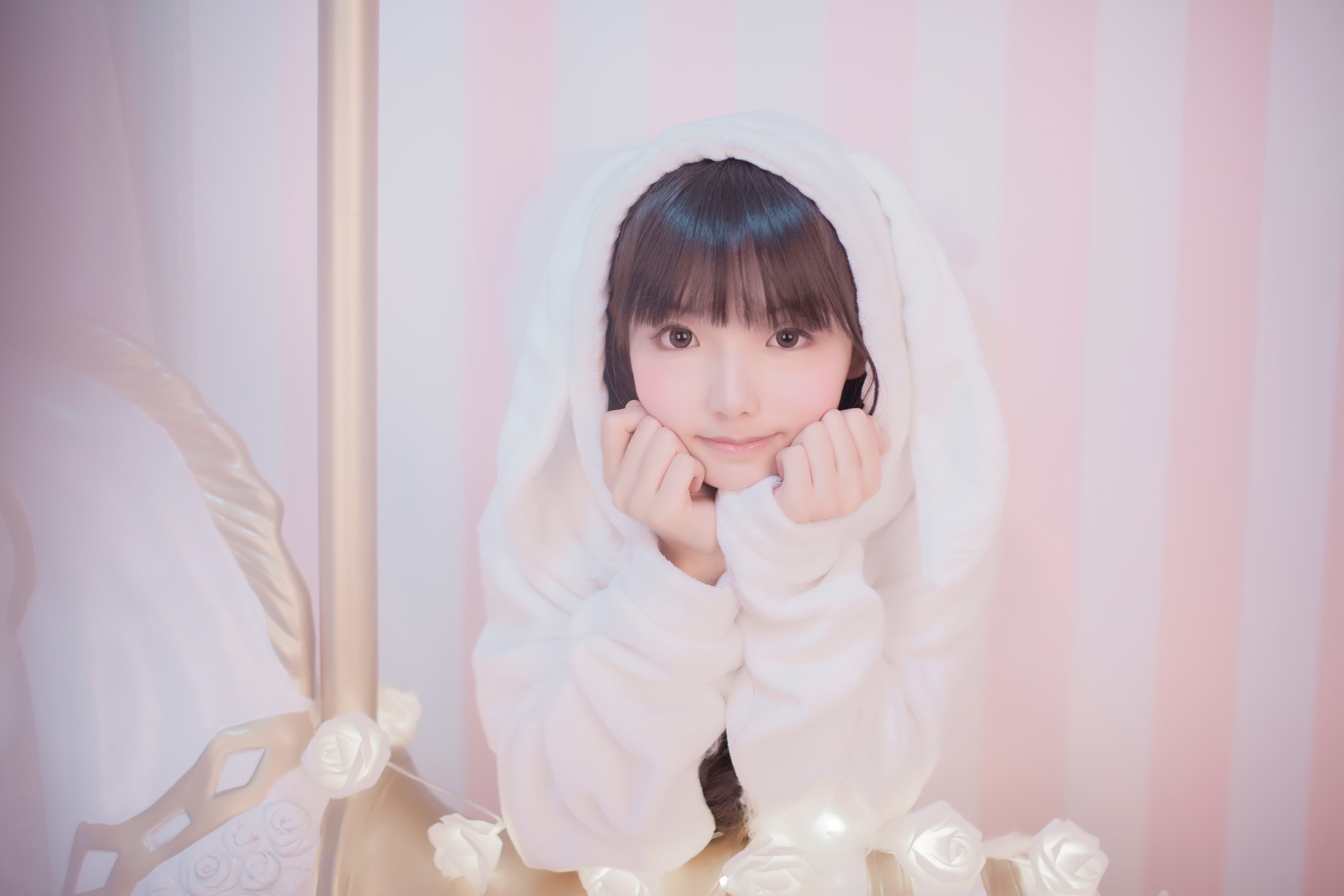 Carousel close-up with multiple stockinged ankles turning beneath a glass dome